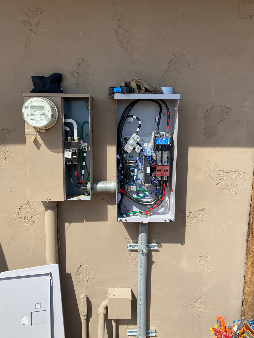 circuit panel outside of an AZ home with a sub panel