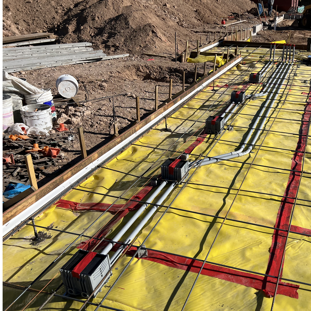Local-Electricians-in-Mariopa-County-AZ Electrical conduit rough-in for a concrete slab foundation by local electricians in Maricopa County, Arizona, before concrete pour.